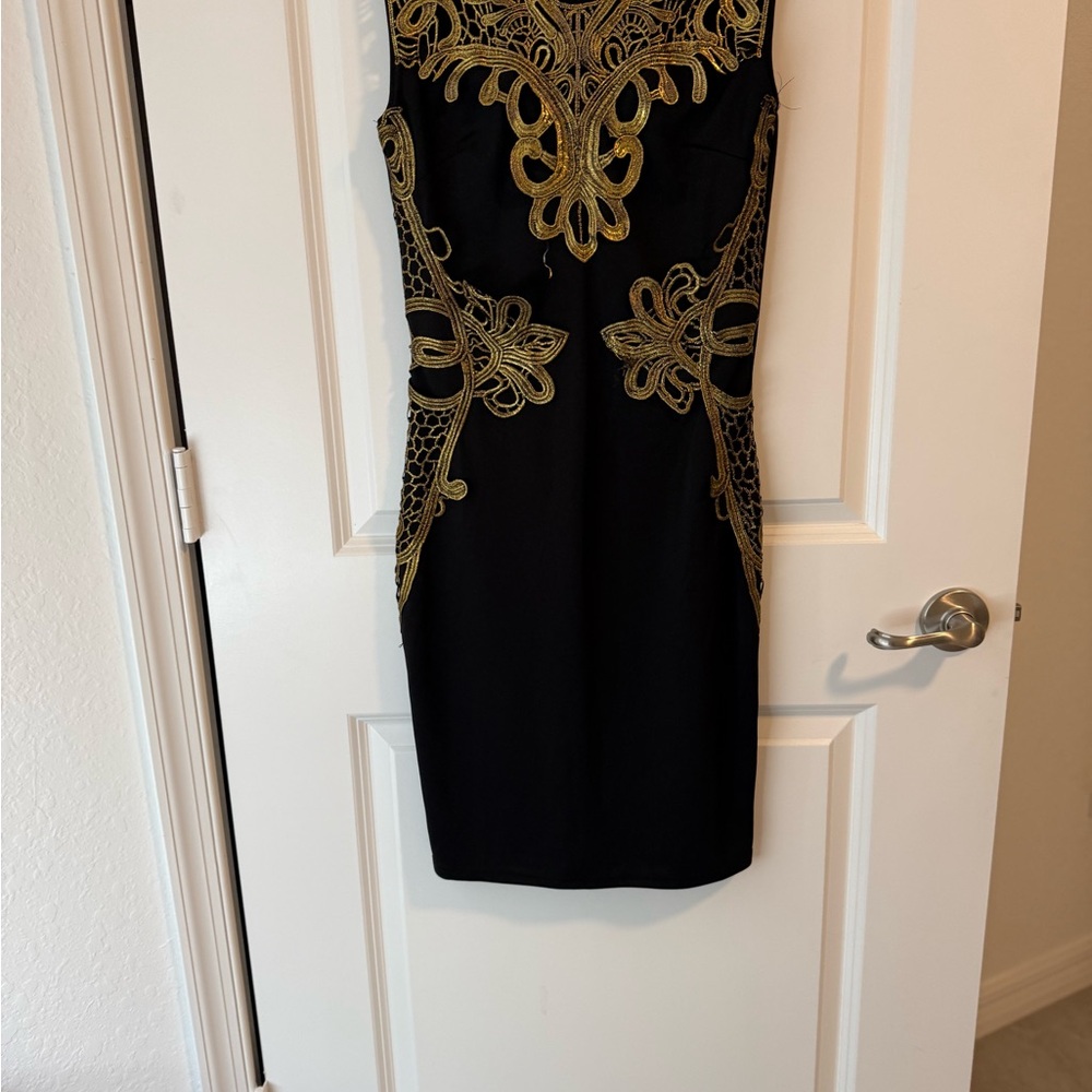 Chic Black Dress with Gold Accents